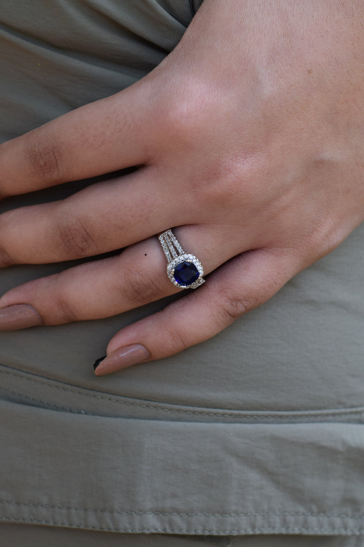 sapphire silver ring on hand
